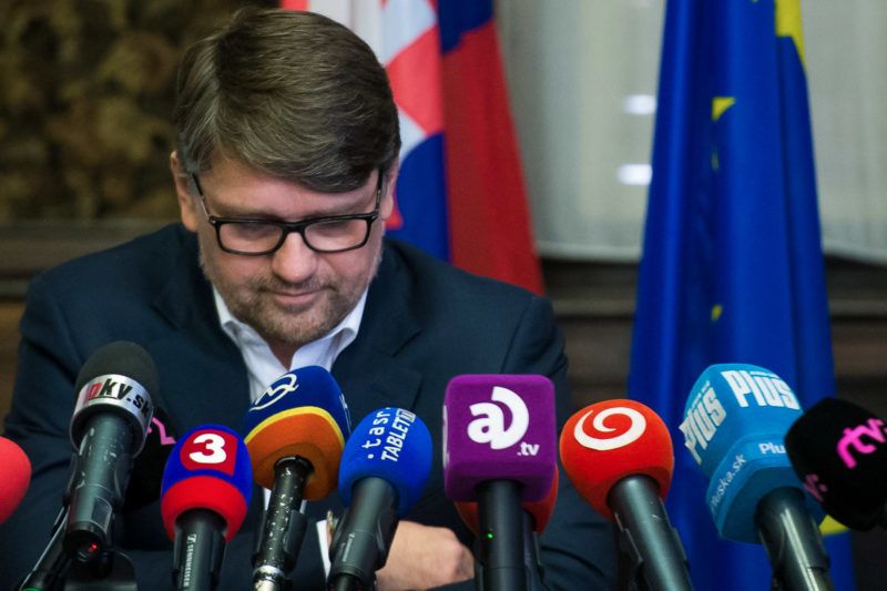 Slovak Minister of Culture, Marek Madaric looks down during a press conference to announce his resignation on February 28, 2018 in Bratislava, Slovakia, after the murder of Slovak journalist Jan Kuciak and his fiancee Martina Kusnirova.
Murdered Slovak journalist Jan Kuciak was probing alleged high-level political corruption linked to the Italian mafia, the news portal he worked for revealed on February 28, 2018, as the killing sparked calls for fresh anti-corruption protests in the small EU state. Kuciak, 27, and his fiancee Martina Kusnirova were found shot dead on February 25, 2018 at his home in Velka Maca, a town to the east of Bratislava, raising concerns at home and abroad about media freedoms and the level of corruption in Slovakia. / AFP PHOTO / VLADIMIR SIMICEK