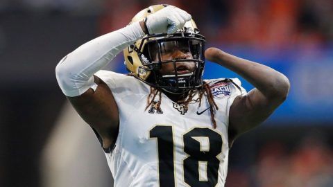 ATLANTA, GA - JANUARY 01: Shaquem Griffin #18 of the UCF Knights celebrates after sacking Jarrett Stidham #8 of the Auburn Tigers (not pictured) in the third quarter during the Chick-fil-A Peach Bowl at Mercedes-Benz Stadium on January 1, 2018 in Atlanta, Georgia.   Kevin C. Cox/Getty Images/AFP