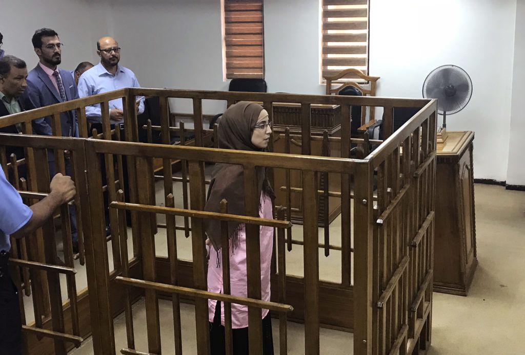 French jihadist Djamila Boutoutaou attends her trial at the Central penal Court in Baghdad, on April 17, 2018.
French jihadist Boutoutaou, 29, was sentenced to life in prison for belonging to the Islamic State group, the latest in a series of court judgments against jihadists. / AFP PHOTO / Ammar Karim