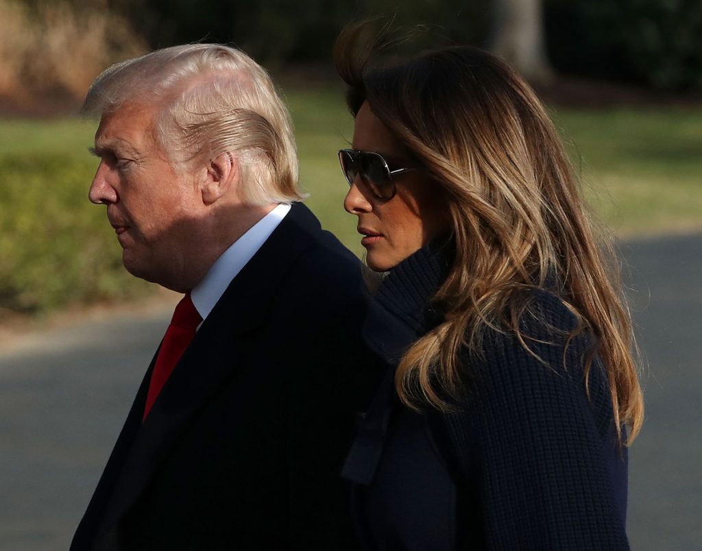 WASHINGTON, DC - MARCH 19: U.S. President Donald Trump and first lady Melania Trump arrive at the White House March 19, 2018 in Washington, DC. The Trumps traveled to New Hampshire where the president delivered remarks about the ongoing opioid crisis at Manchester Community College.   (Photo by Mark Wilson/Getty Images)