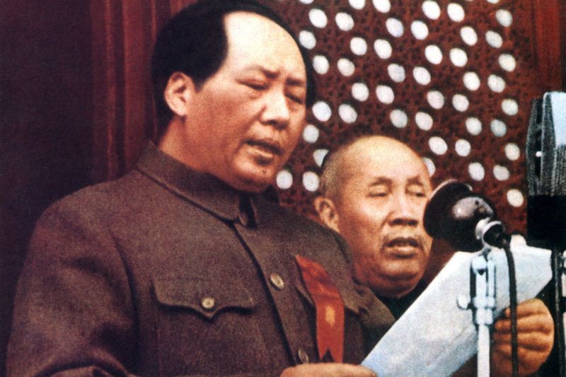A retouched picture released by the Chinese official news agency showing the Chairman Mao Zedong ( ) proclaiming 01 October 1949 at the rostrum of Tiananmen Square in Beijing the establishment of the People's Republic of China. Person on right: Dong Bi-wu.   CHINA OUT / AFP PHOTO / XINHUA