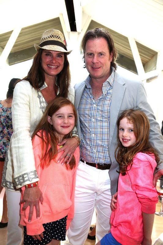 BRIDGEHAMPTON, NY - MAY 26:  Brooke Shields, Chris Henchy  and daughters Rowan Henchy  and Grier Henchy attend  Haley & Jason Binn's Annual DuJour Summer Kick Off Soiree with The Borgata Hotel & Casino >> at Bridgehampton Tennis and Surf Club on May 26, 2013 in Bridgehampton, New York.  (Photo by Sonia Moskowitz/Getty Images for DuJour Magazine)