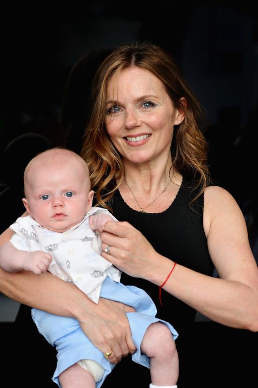 BAHRAIN, BAHRAIN - APRIL 16: Geri Horner with baby Montague in the Paddock before the Bahrain Formula One Grand Prix at Bahrain International Circuit on April 16, 2017 in Bahrain, Bahrain.  (Photo by Mark Thompson/Getty Images)