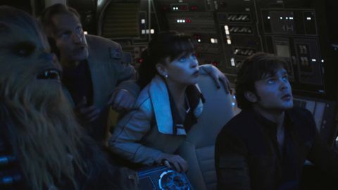 Joonas Suotamo is Chewbacca, Woody Harrelson is Beckett, Emilia Clarke is Qi’ra and Alden Ehrenreich is Han Solo in SOLO: A STAR WARS STORY.