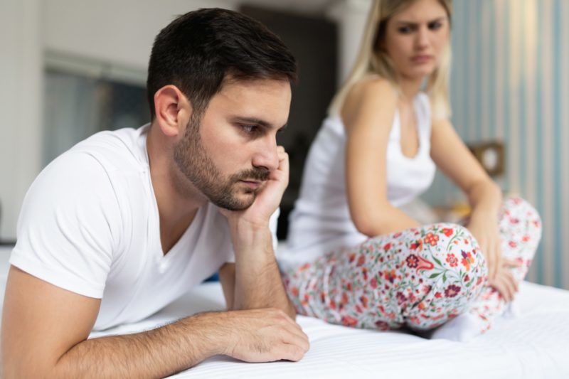 Woman and man having conflict and going through crisis in relationship