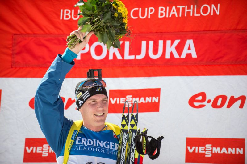First place winner Bjorn Ferry of Sweden poses on the podium after the men's Biathlon 15km mass start of the IBU biathlon World Cup in Pokljuka, Slovenia, on March 9, 2014. AFP PHOTO / RENE GOMOLJ (Photo by Rene Gomolj / AFP)