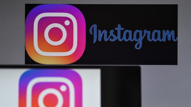Logos of US social network Instagram are displayed on the screen of a computer and a smartphone, on May 2, 2019 in Nantes, western France. (Photo by LOIC VENANCE / AFP)