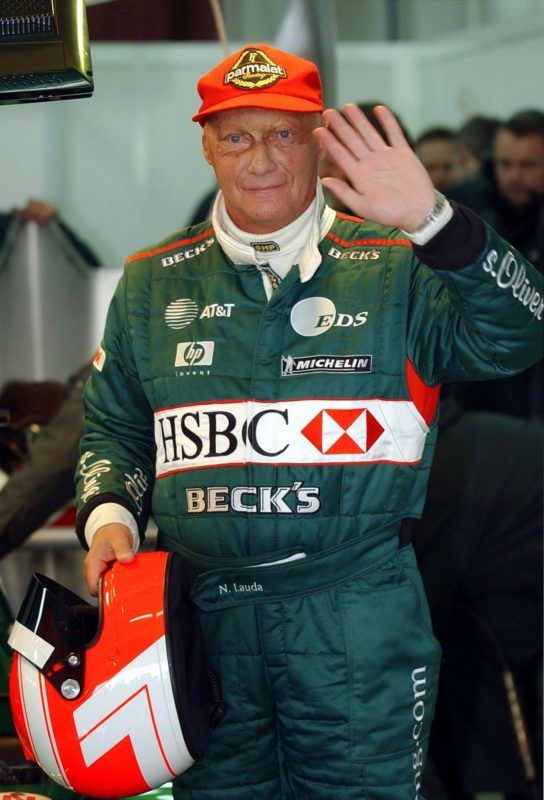 (FILES) In this file photo taken on January 13, 2002 The Ford-backed Formula One Jaguar racing team boss Niki Lauda waves after testing the last season's Jaguar R2 Formula One at Valencia's racetrack. - Legendary Formula One driver Niki Lauda has died at the age of 70, his family said in a statement released to Austrian media on May 21, 2019. (Photo by Pierre-Philippe MARCOU / AFP)