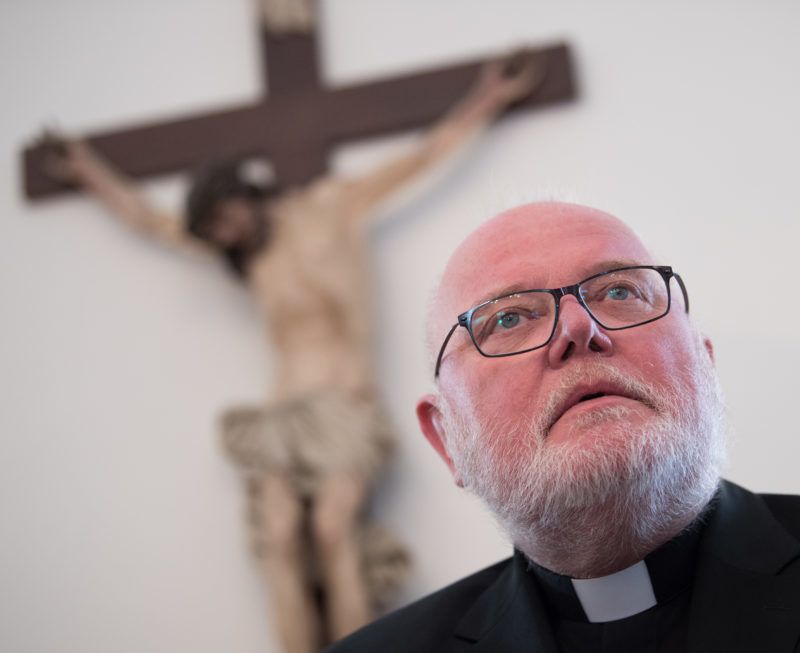 24 September 2018, Hessen, Fulda: Cardinal Reinhard Marx, Archbishop of Munich and Freising and Chairman of the German Bishops' Conference, will take his seat in the meeting room at the beginning of the Fall Plenary Assembly of the German Bishops' Conference. The German bishops traditionally meet in September at the tomb of St. Boniface in the East Hessian cathedral city. Photo: Arne Dedert/dpa